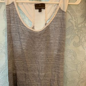 Sleeveless blouse with sheer lighter back
